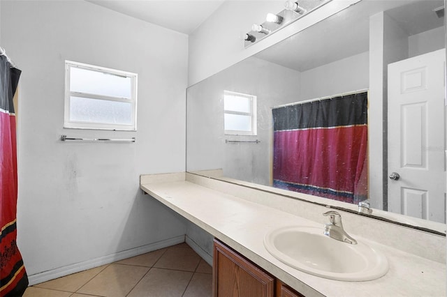 1040 Cannock Dr, Kissimmee, FL 34758 - bathroom featuring vanity, tile patterned floors, and curtained shower