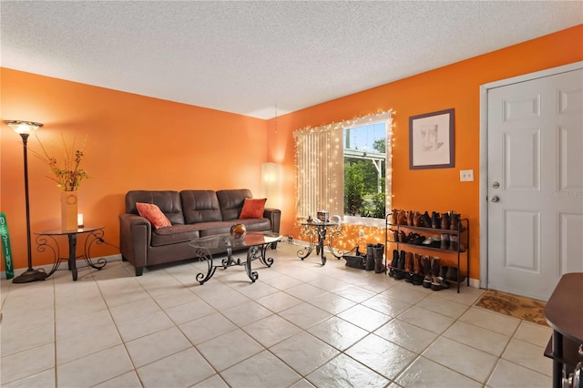4235 Fay Blvd, Cocoa, FL 32927 - living area with light tile patterned floors and a textured ceiling