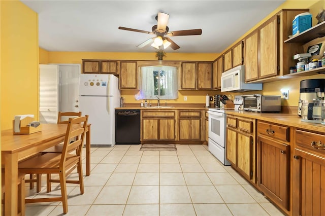 4235 Fay Blvd, Cocoa, FL 32927 - kitchen featuring white appliances, brown cabinetry, a ceiling fan, open shelves, and light countertops