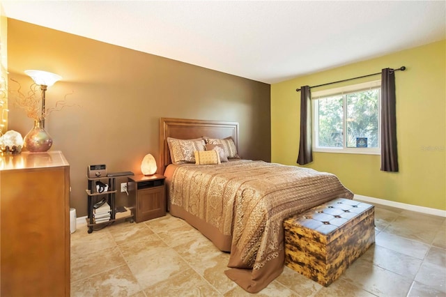 4235 Fay Blvd, Cocoa, FL 32927 - bedroom with baseboards and light tile patterned floors