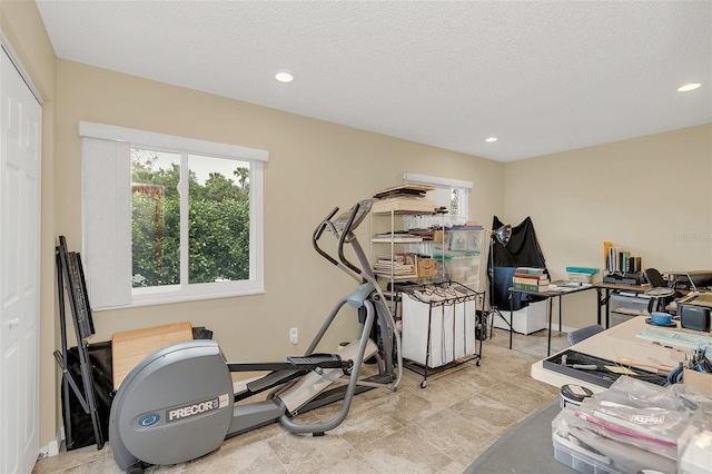 4235 Fay Blvd, Cocoa, FL 32927 - workout area featuring healthy amount of natural light, recessed lighting, and a textured ceiling