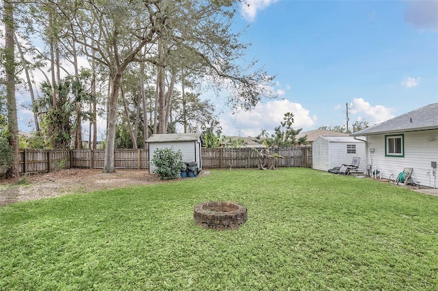 4235 Fay Blvd, Cocoa, FL 32927 - fenced backyard with a shed and an outdoor fire pit