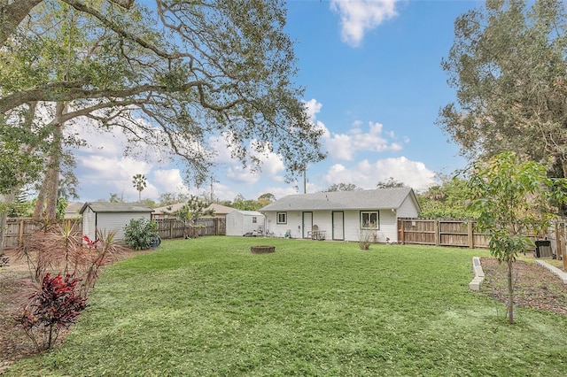 4235 Fay Blvd, Cocoa, FL 32927 - fenced backyard with a storage unit