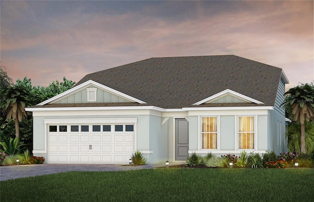 8267 Fenton St, Orlando, FL 32836 - view of front of home featuring a garage, driveway, a shingled roof, and a yard