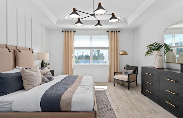 8267 Fenton St, Orlando, FL 32836 - bedroom featuring a raised ceiling, ornamental molding, light wood-style floors, and a water view