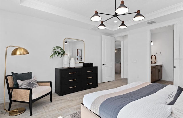 8267 Fenton St, Orlando, FL 32836 - bedroom featuring a raised ceiling, crown molding, light wood-style floors, and ensuite bathroom