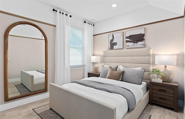 8267 Fenton St, Orlando, FL 32836 - bedroom with light wood-style flooring and recessed lighting