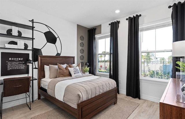 8267 Fenton St, Orlando, FL 32836 - bedroom featuring light wood-style floors and recessed lighting