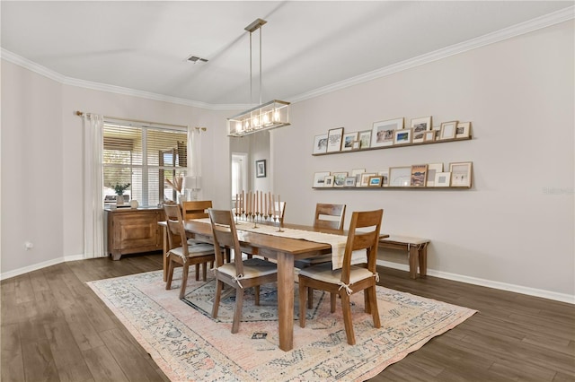 2018 Bay Clover Dr, Winter Garden, FL 34787 - dining room with wood finished floors, crown molding, and a chandelier