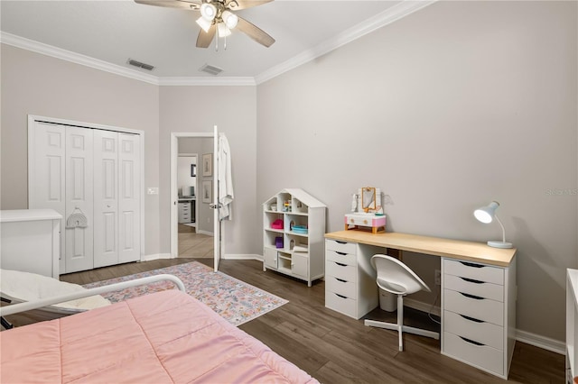 2018 Bay Clover Dr, Winter Garden, FL 34787 - bedroom with crown molding, dark wood-style flooring, ceiling fan, and a closet