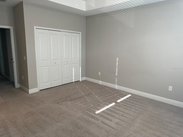 2435 Standing Rock Cir, Oakland, FL 34787 - unfurnished bedroom featuring carpet flooring and a closet