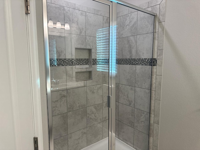 2435 Standing Rock Cir, Oakland, FL 34787 - bathroom featuring a shower stall