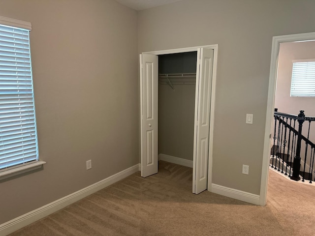 2435 Standing Rock Cir, Oakland, FL 34787 - unfurnished bedroom with light carpet and a closet