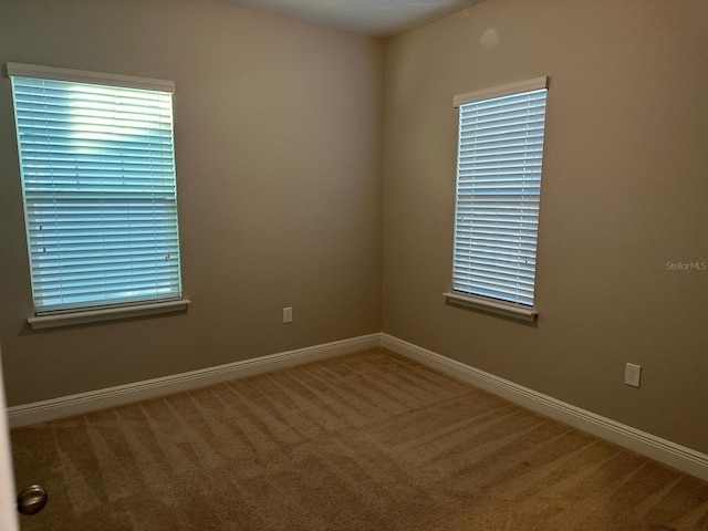 2435 Standing Rock Cir, Oakland, FL 34787 - unfurnished room featuring carpet flooring