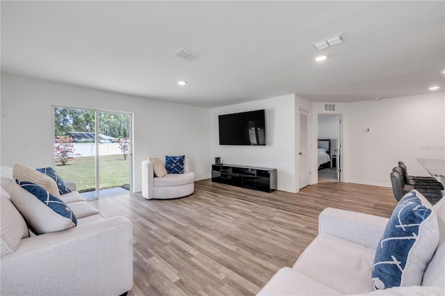 40 Briarvue Ln, Palm Coast, FL 32137 - living room with light wood-style flooring and recessed lighting