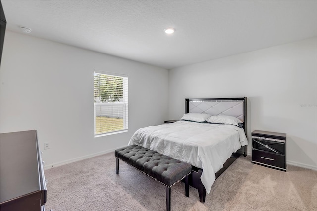 40 Briarvue Ln, Palm Coast, FL 32137 - bedroom with light colored carpet and baseboards