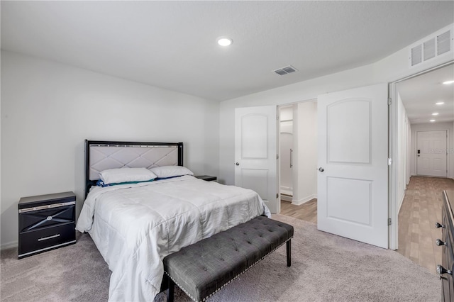 40 Briarvue Ln, Palm Coast, FL 32137 - bedroom with light carpet and recessed lighting