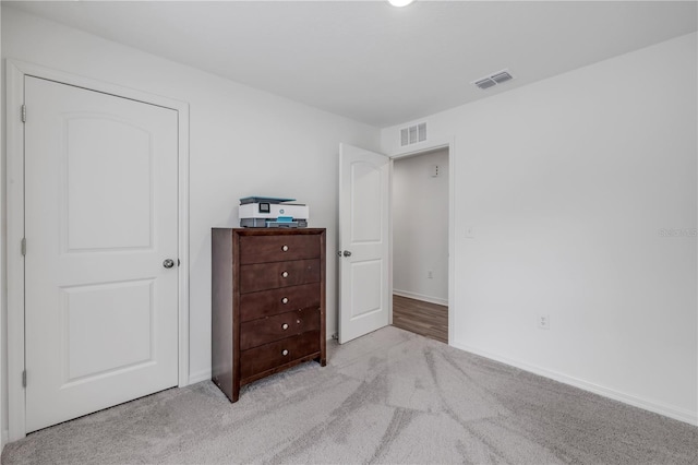 40 Briarvue Ln, Palm Coast, FL 32137 - carpeted bedroom with baseboards