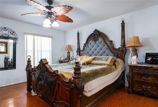 1208 Sandestin Way, Orlando, FL 32824 - bedroom with wood finished floors, a textured ceiling, and a ceiling fan