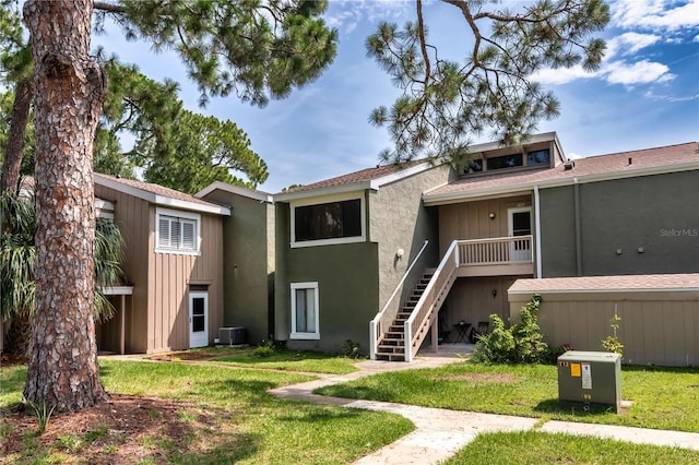 6019 Windhover Dr Unit C10-2, Orlando, FL 32819 - view of property with stairs