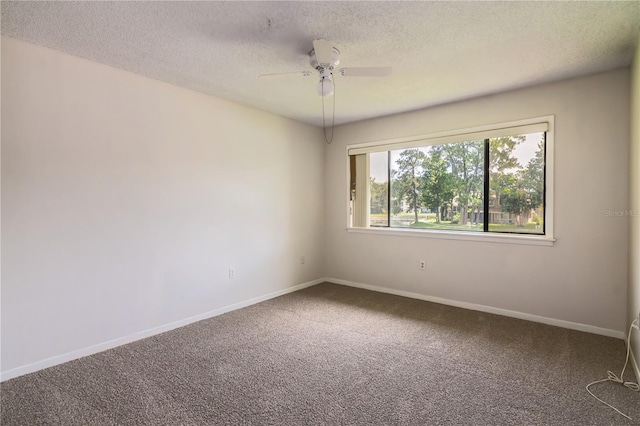 6019 Windhover Dr Unit C10-2, Orlando, FL 32819 - spare room featuring carpet, a textured ceiling, and ceiling fan