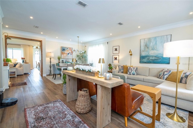13235 Vennetta Way, Windermere, FL 34786 - living room featuring ornamental molding, recessed lighting, and wood finished floors