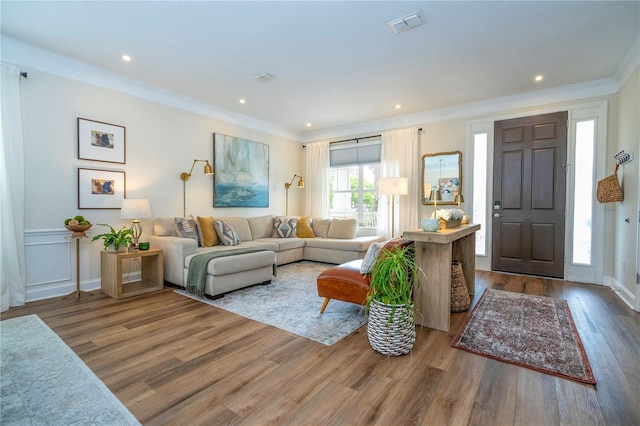 13235 Vennetta Way, Windermere, FL 34786 - living room featuring wood finished floors, crown molding, and recessed lighting
