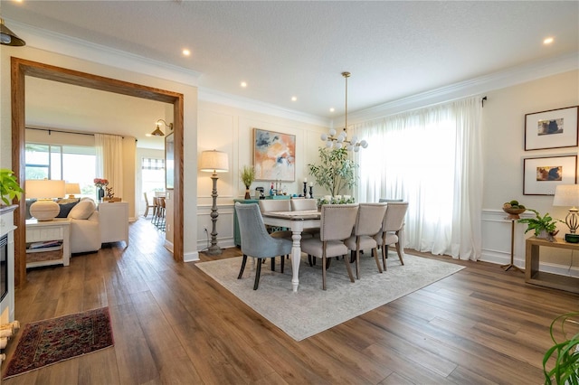 13235 Vennetta Way, Windermere, FL 34786 - dining space with ornamental molding, wood finished floors, and recessed lighting