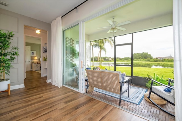13235 Vennetta Way, Windermere, FL 34786 - sunroom / solarium featuring a water view and ceiling fan