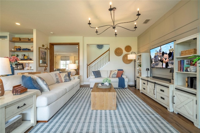 13235 Vennetta Way, Windermere, FL 34786 - living room featuring a chandelier, wood finished floors, and stairs