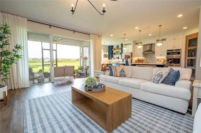 13235 Vennetta Way, Windermere, FL 34786 - living room featuring wood finished floors, recessed lighting, and ceiling fan