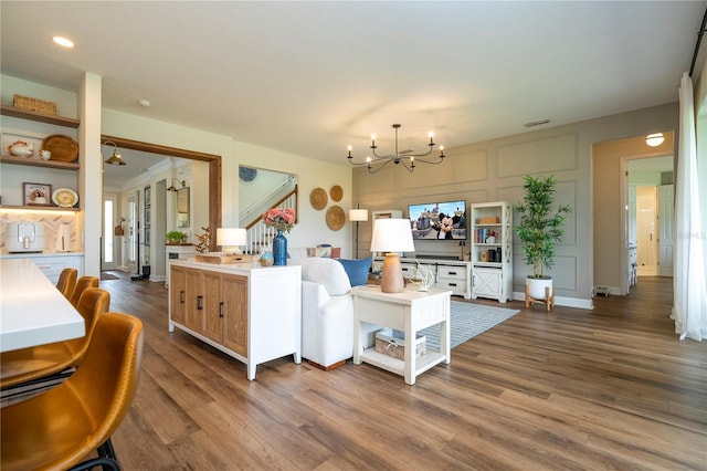 13235 Vennetta Way, Windermere, FL 34786 - living room with a chandelier, wood finished floors, and recessed lighting