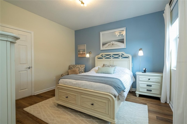 13235 Vennetta Way, Windermere, FL 34786 - bedroom featuring dark wood-style floors and baseboards