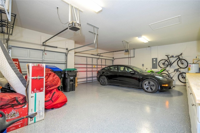 13235 Vennetta Way, Windermere, FL 34786 - garage with electric water heater, electric panel, and a garage door opener