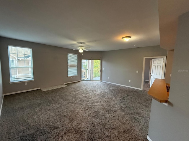 2015 Erving Cir Unit 307, Ocoee, FL 34761 - unfurnished room featuring a ceiling fan and dark carpet