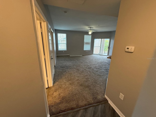 2015 Erving Cir Unit 307, Ocoee, FL 34761 - corridor with baseboards and carpet floors