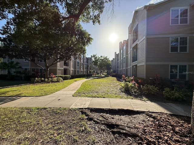2015 Erving Cir Unit 307, Ocoee, FL 34761 - view of home's community featuring a yard