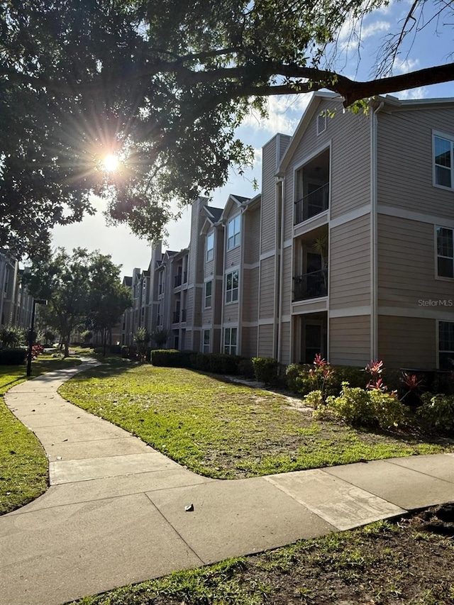 2015 Erving Cir Unit 307, Ocoee, FL 34761 - view of home's community featuring a yard