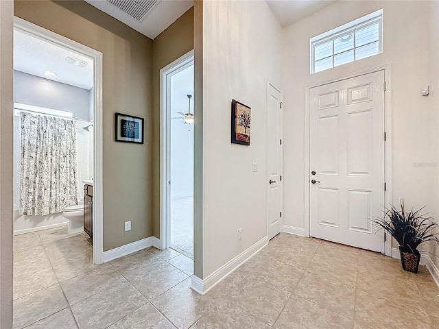 297 Shadow Ridge Trl, Ponte Vedra, FL 32081 - foyer featuring light tile patterned floors and baseboards