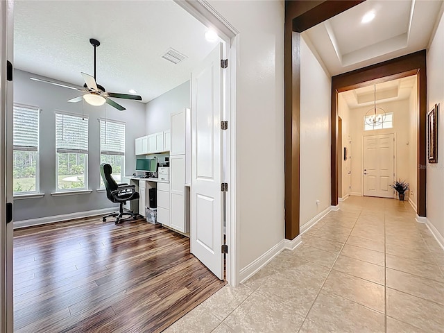 297 Shadow Ridge Trl, Ponte Vedra, FL 32081 - home office featuring ceiling fan, a raised ceiling, recessed lighting, built in study area, and light tile patterned floors