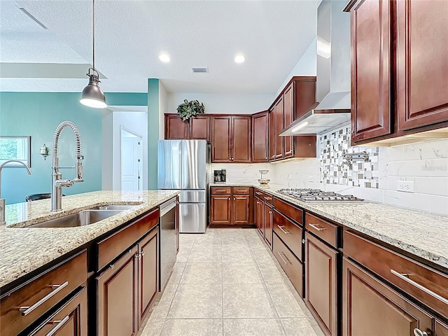 297 Shadow Ridge Trl, Ponte Vedra, FL 32081 - kitchen with wall chimney exhaust hood, stainless steel appliances, light stone countertops, decorative light fixtures, and a textured ceiling