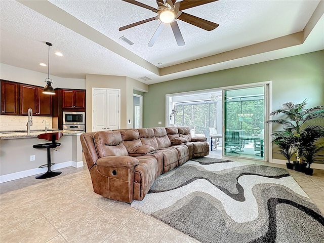297 Shadow Ridge Trl, Ponte Vedra, FL 32081 - living area featuring ceiling fan, a textured ceiling, light tile patterned flooring, and recessed lighting