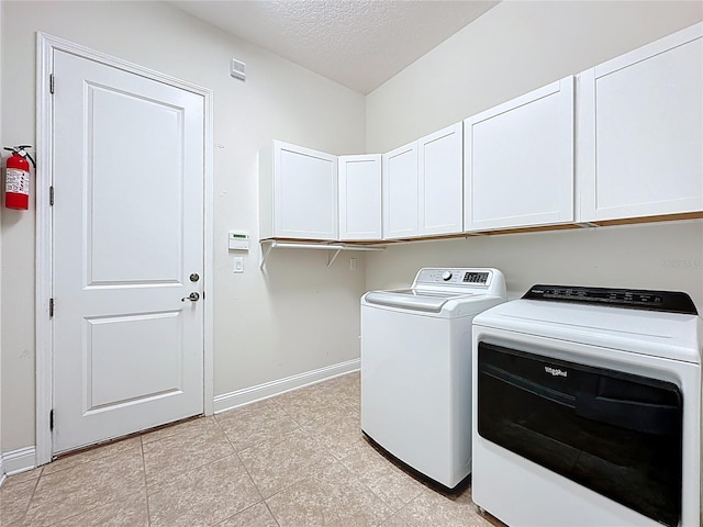 297 Shadow Ridge Trl, Ponte Vedra, FL 32081 - washroom featuring cabinet space, washing machine and clothes dryer, and a textured ceiling