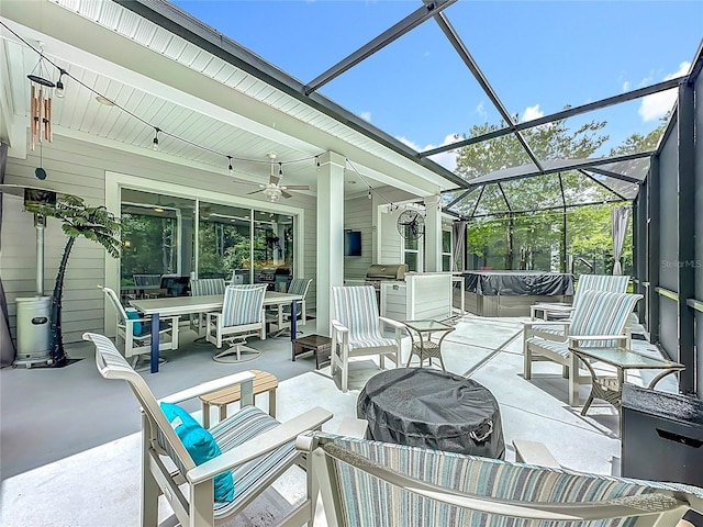 297 Shadow Ridge Trl, Ponte Vedra, FL 32081 - view of patio / terrace with outdoor dining space, a hot tub, a ceiling fan, and a lanai