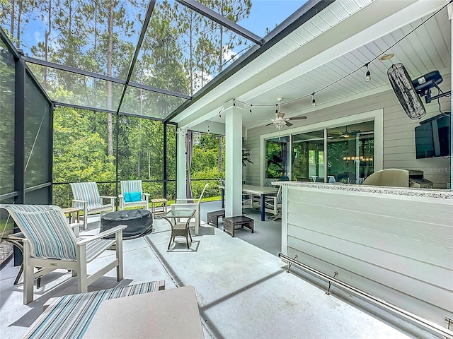 297 Shadow Ridge Trl, Ponte Vedra, FL 32081 - view of patio / terrace featuring an outdoor fire pit, glass enclosure, and a ceiling fan