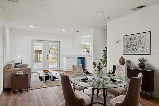 201 E 7th St, Chuluota, FL 32766 - dining room featuring wood finished floors, french doors, and recessed lighting