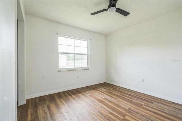 201 E 7th St, Chuluota, FL 32766 - empty room featuring wood finished floors and ceiling fan