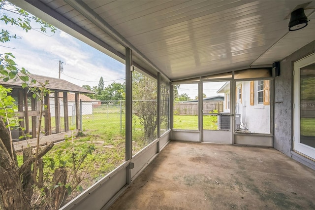 201 E 7th St, Chuluota, FL 32766 - unfurnished sunroom featuring lofted ceiling