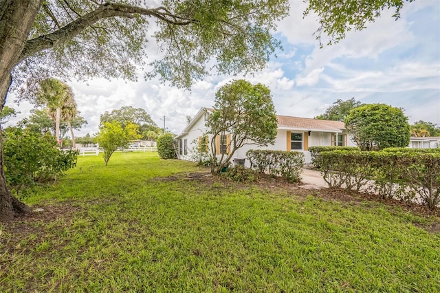 201 E 7th St, Chuluota, FL 32766 - view of green lawn