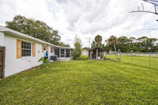 201 E 7th St, Chuluota, FL 32766 - fenced backyard with a sunroom and a storage shed